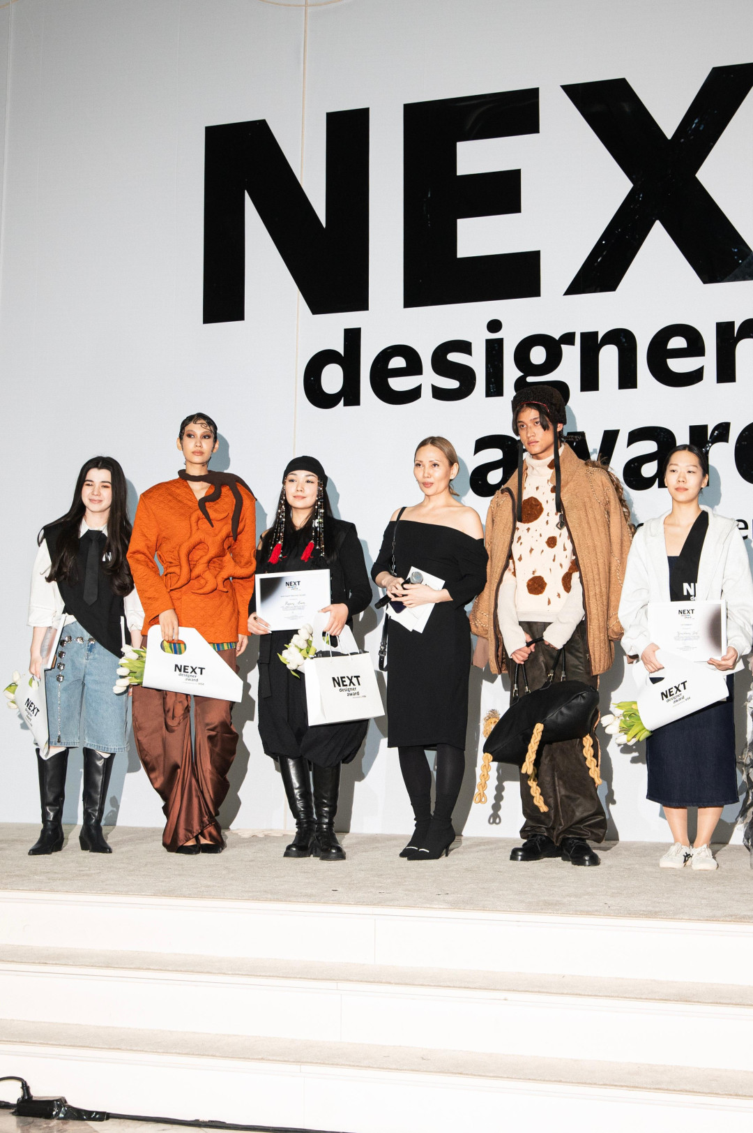 Next Designer Award. Empowered by Visa